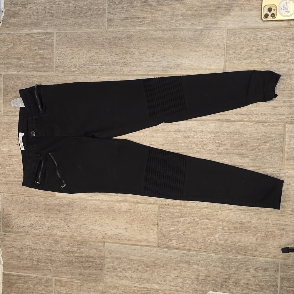 Black moto jeans